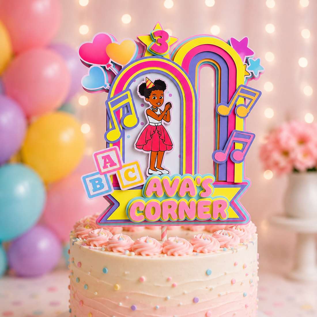 Colorful custom Gracie’s Corner cake topper personalized with child’s name and age for a fun kids birthday celebration.