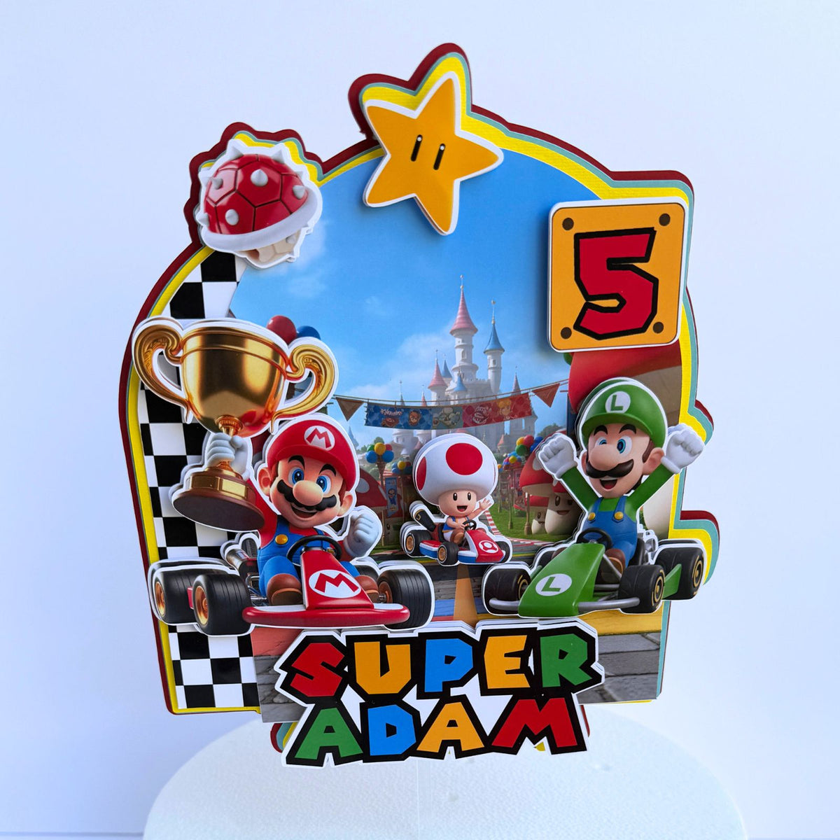 Custom Super Mario birthday cake topper with layered design, personalized name and age for a colorful kids birthday celebration.