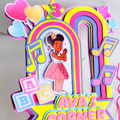 Handmade personalized Gracie’s Corner birthday cake topper with custom name and age, featuring colorful layered party details.