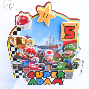 Handmade personalized Super Mario birthday cake topper featuring custom name and age with colorful layered party details.